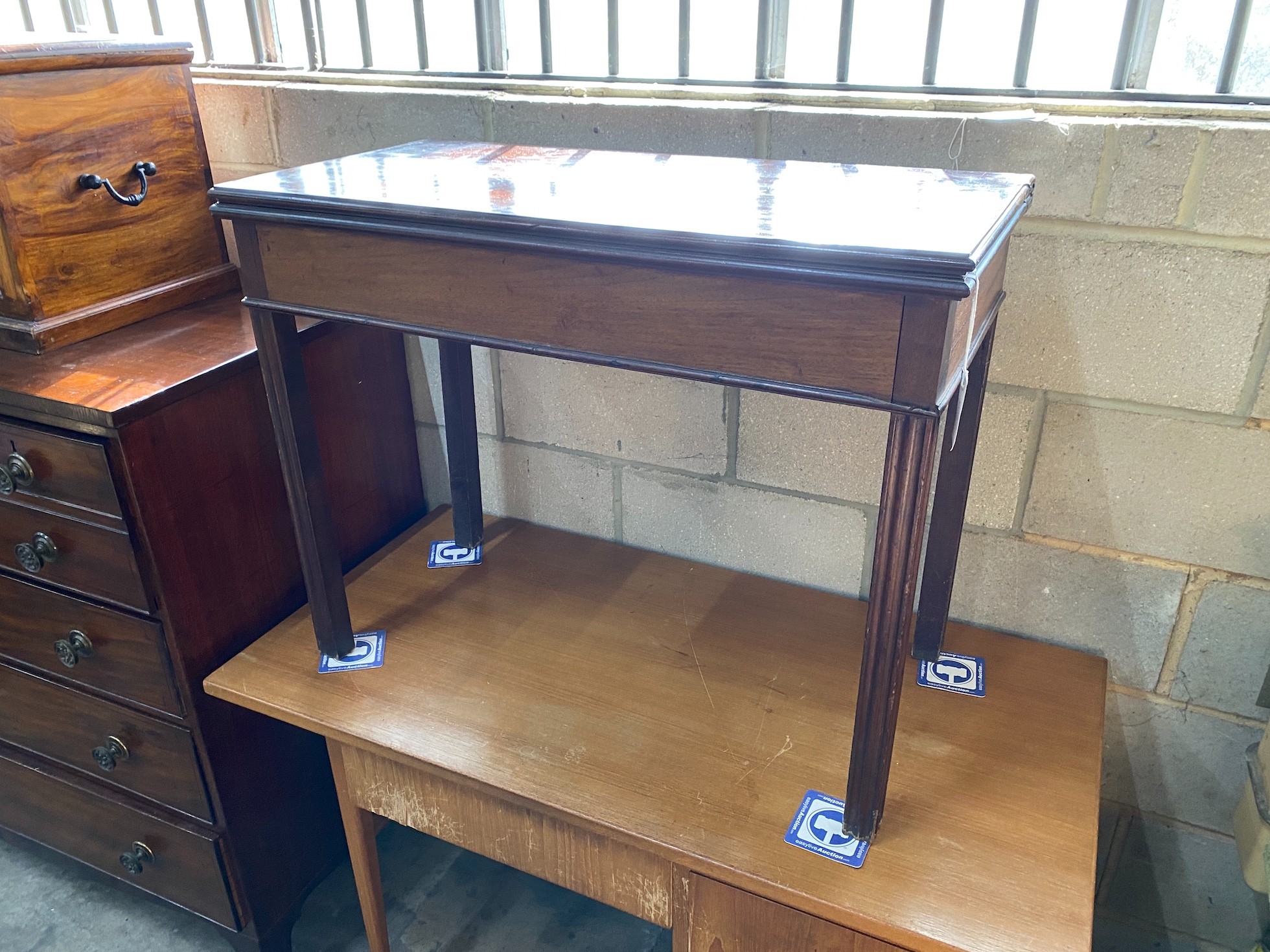 A George III rectangular mahogany folding card table, width 90cm, depth 45cm, height 71cm